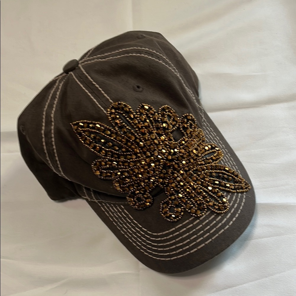 Brown and Gold Embellished Hat with Intricate Detailing